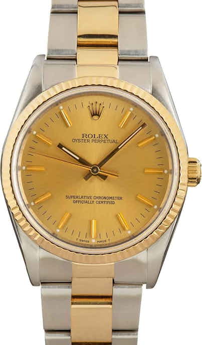 Pre-Owned Rolex Oyster Perpetual 14233 Champagne Dial