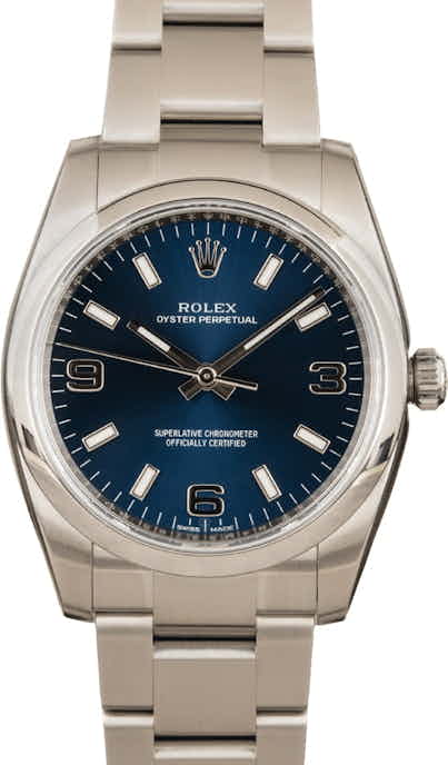 Unworn Rolex Oyster Perpetual 114200 Blue Index Dial