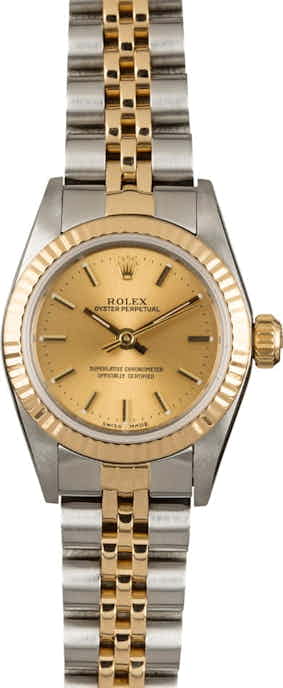 PreOwned Rolex Oyster Perpetual 67193 Champagne Index Dial